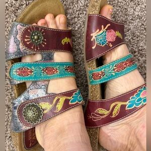 L'Artiste by Spring Step leather slide sandals with colorful floral design.